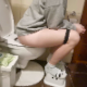 A girl records herself shitting while sitting on a toilet and using a squatty potty. Lots of farting, grunting and pissing followed by plops. Side view with no face seen. Presented in 720P HD. About 7.5 minutes.